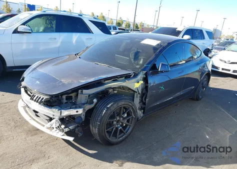 2021 Tesla Model 3 Standard Range Plus Rear-Wheel Drive from USA, damaged, VIN 5YJ3E1EA3MF097773